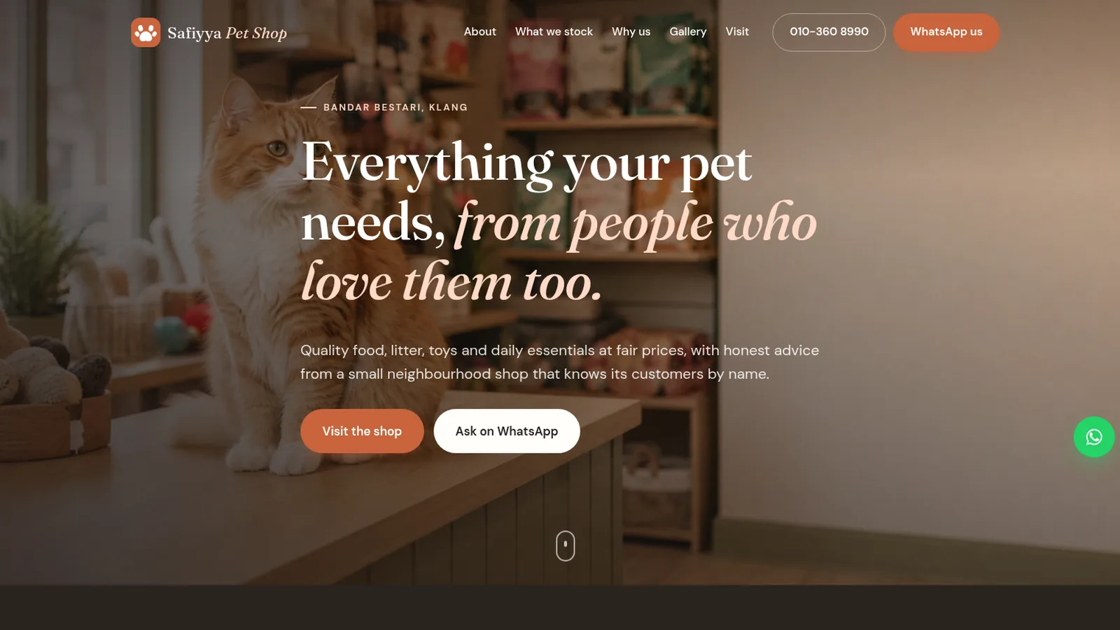 Safiyya Pet Shop website, hero with a cat on the shop counter